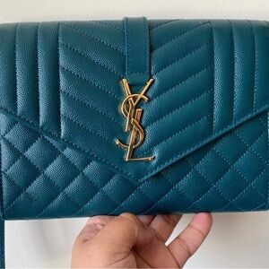 Authentic YSL Monogram Sea Turquoise Wristlet Clutch
